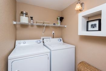 Laundry Room at Apres Apartments in Denver, CO